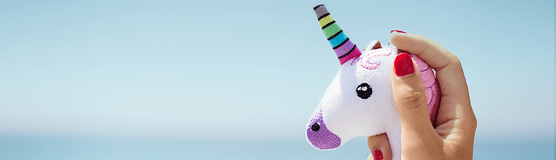 unicorn float toy on a beach