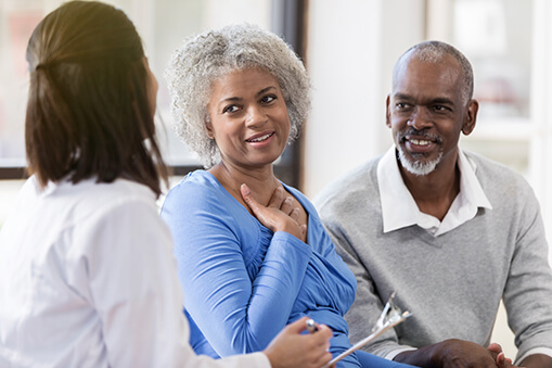 Senior couple receive good news from doctor