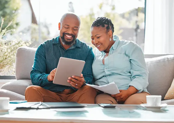 couple looking up free financial resources online