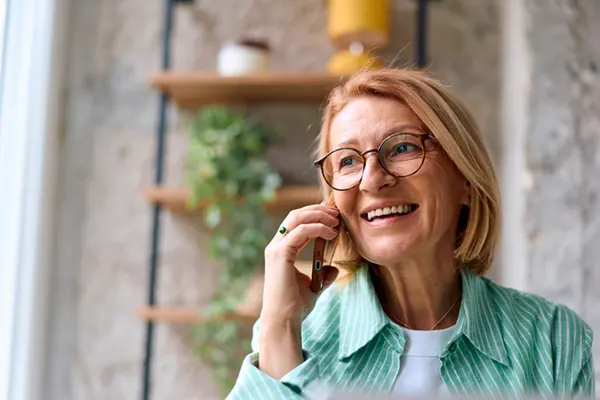 lady on the phone with MoneySolver support team